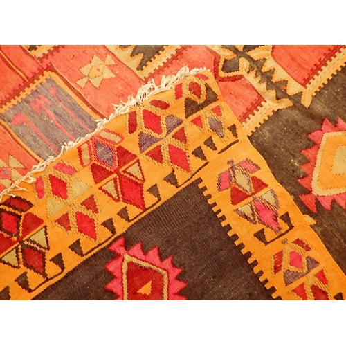 1045 - A Middle Eastern tribal large Kelim hanging rug with brightly coloured geometrical decoration 362 x ... 