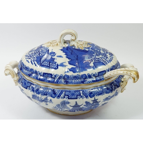 105 - A large Royal Worcester oval blue and white tureen with lid and ladle - damage to base, 33cm