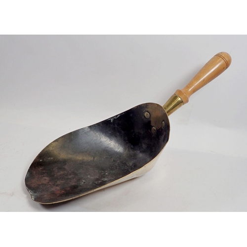 1054 - A 19th century brass grain shovel with fruit wood handle