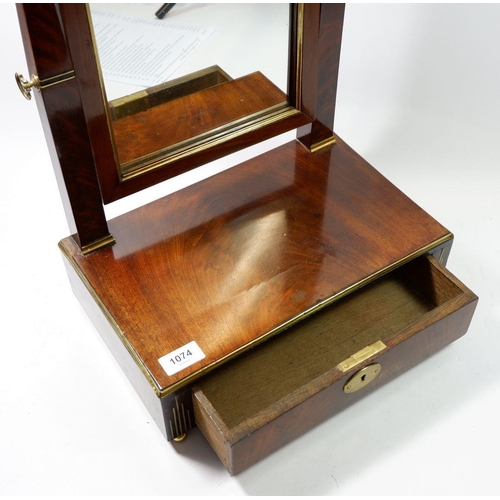 1074 - A Biedermeier rosewood swing toiletry mirror with drawer to base, 49cm tall