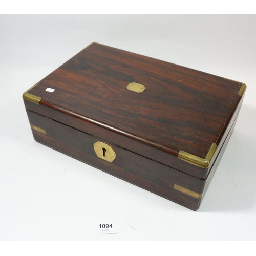 1094 - A 19th century rosewood brassbound writing slope with fitted interior, 35 x 23 x 12cm