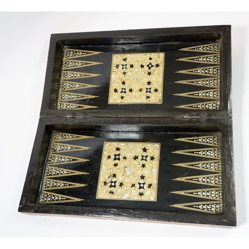 1095 - A late 19th century Moroccan style mother of pearl inlaid games box with chess board top and backgam... 