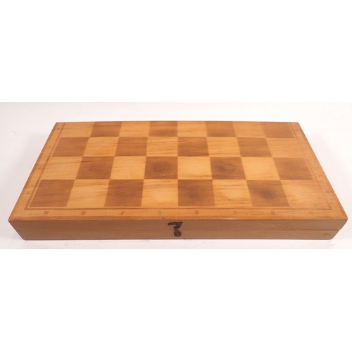 1192 - A wooden chess set with chessboard form box