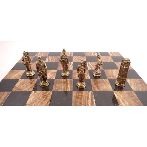 1194 - A metal figurative chess set with knights and horses and 'marble' chess board