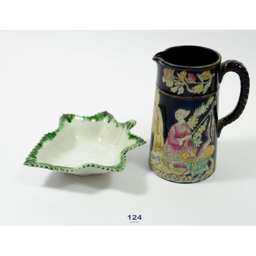 124 - A creamware leaf form pickle dish and a Victorian pottery jug decorated Chinoiserie scenes