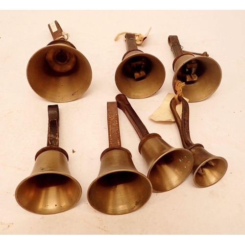 1245 - A set of twenty brass handbells with leather straps (seven missing ringers) eleven marked Mears