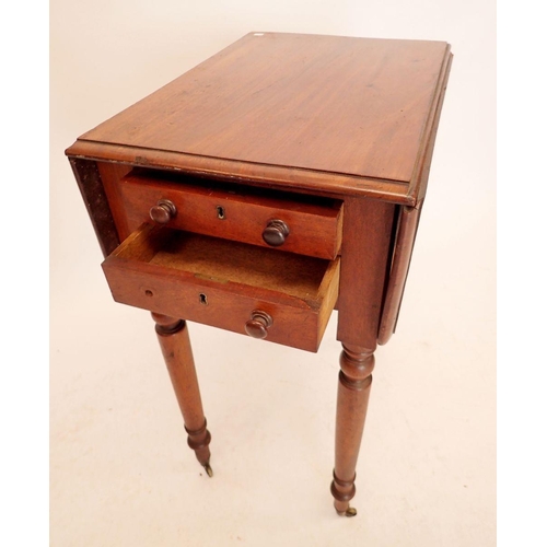 1261 - A Victorian mahogany dropleaf work table with two drawers and turned supports