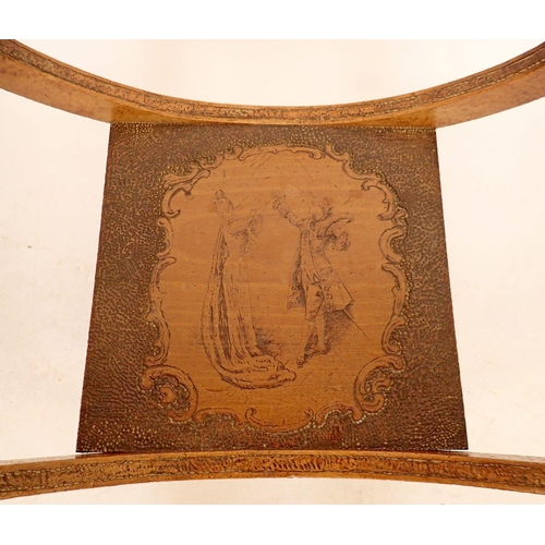 1273 - An Edwardian X frame mahogany stool with pokerwork decoration