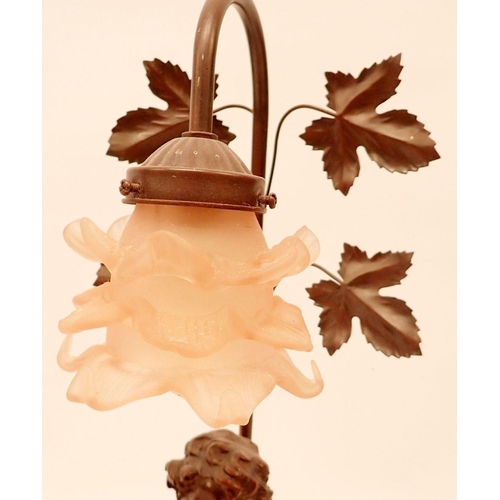 1276 - A reproduction bronze finish table lamp with frilled glass pink shade, 64cm