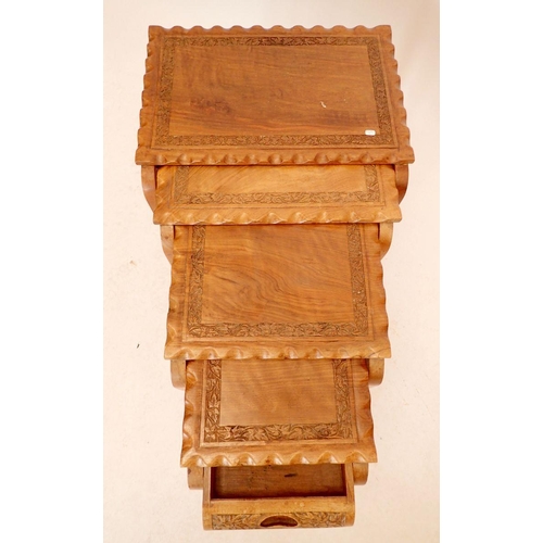 1289 - A Chinese hardwood nest of four occasional tables