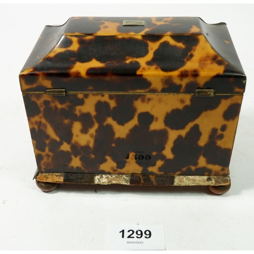 1299 - A 19th century small tortoiseshell tea caddy with two caddies within and ball feet, 13.5 x 8 x 12cm