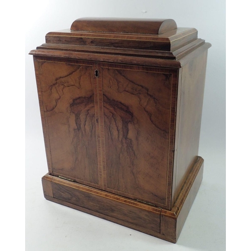 1307 - A Victorian walnut ladies workbox with rise top and lift out tray over drop front concealing two dra... 