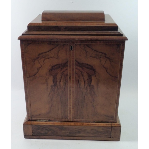 1307 - A Victorian walnut ladies workbox with rise top and lift out tray over drop front concealing two dra... 