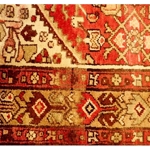 1338 - A Persian Hamadan full pile runner with red ground 326 x 110cm