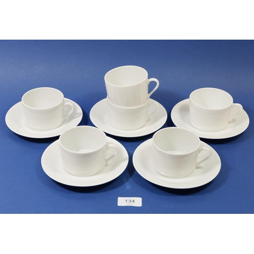 134 - A Limoges white set of six coffee cups five and saucers