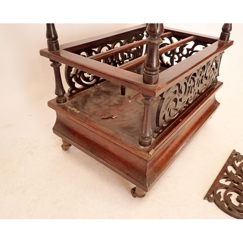 1344 - A Victorian rosewood Canterbury whatnot with fretwork decoration and drawer to base