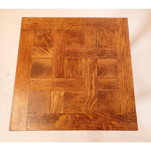 1348 - An oak parquetry topped occasional table