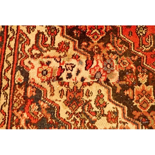 1349A - A Persian Mashad carpet with rich red ground and vintage traditional floral medallions 329 x 219cm -... 