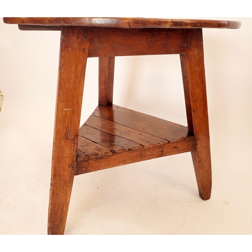 1382 - An 18th century elm topped cricket table with undertier and angular supports, 76cm diameter, 75cm hi... 