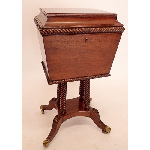 1394 - A 19th century mahogany decanter box on stand with concave moulded rise top all raised on four turne... 