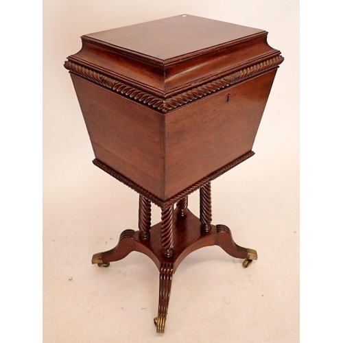 1394 - A 19th century mahogany decanter box on stand with concave moulded rise top all raised on four turne... 