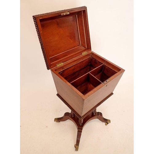 1394 - A 19th century mahogany decanter box on stand with concave moulded rise top all raised on four turne... 