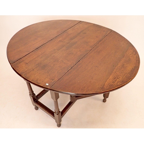 1399 - A Georgian oak gateleg dining table, 122 x 105cm