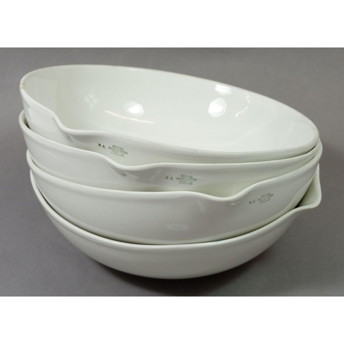 140 - Four Royal Worcester porcelain evaporating dishes, 24cm diameter