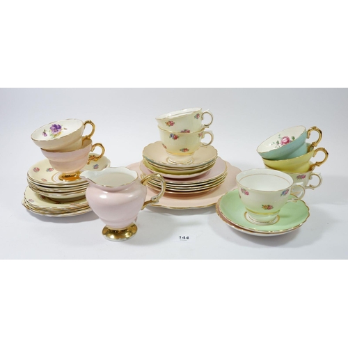 144 - A Rosina Harelquin part tea service comprising: four cups, six saucers, five side plates, dinner pla... 