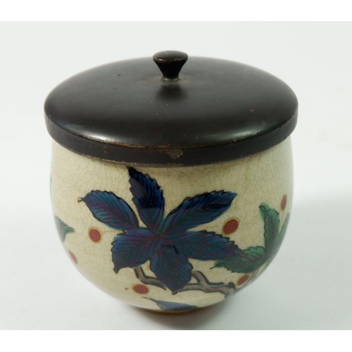 160A - A Japanese Studio pottery vase painted boughs of foliage and berries, with wooden lid, signed, 7cm t... 