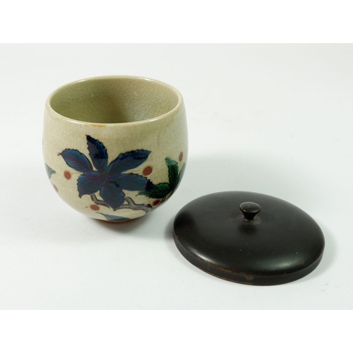 160A - A Japanese Studio pottery vase painted boughs of foliage and berries, with wooden lid, signed, 7cm t... 