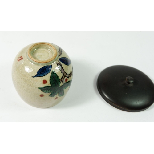 160A - A Japanese Studio pottery vase painted boughs of foliage and berries, with wooden lid, signed, 7cm t... 