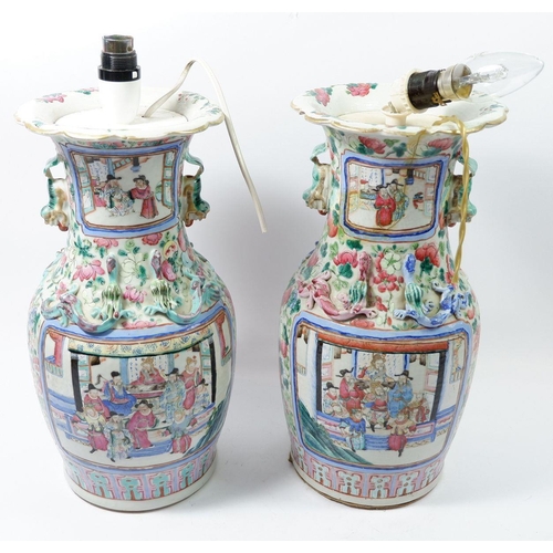 161A - A pair of Chinese Tongzhi period Canton vases painted reserves of dignitaries and warriors with Fo d... 