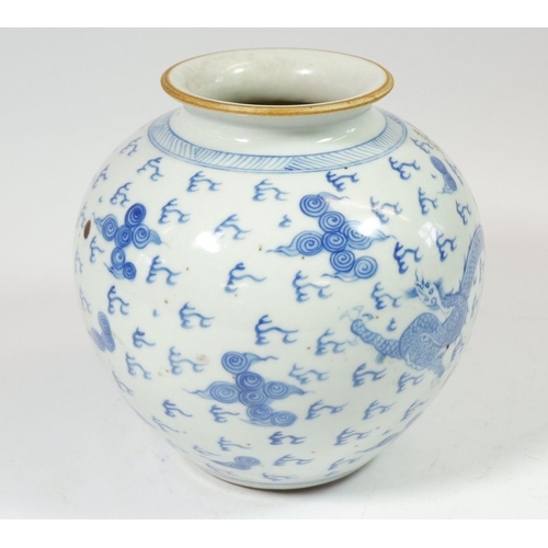 162 - A Chinese Kangxi style blue and white vase painted dragon flying amongst clouds and fire, incised ch... 