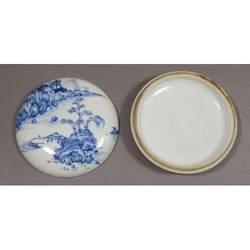 164 - A Chinese blue and white traditional ink paste circular box decorated landscape motifs to top and ba... 