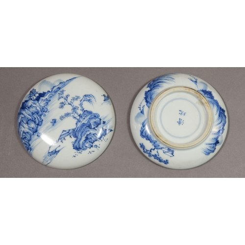 164 - A Chinese blue and white traditional ink paste circular box decorated landscape motifs to top and ba... 