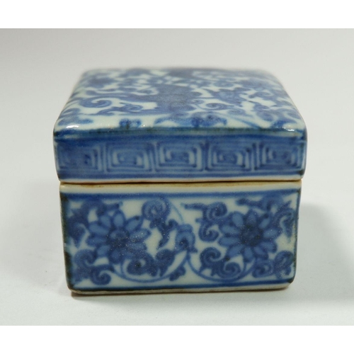 165 - A Chinese blue and white Ming style rectangular small box with all over floral and phoenix decoratio... 