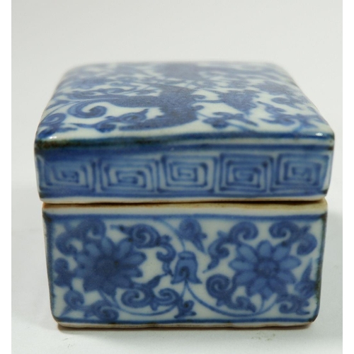 165 - A Chinese blue and white Ming style rectangular small box with all over floral and phoenix decoratio... 