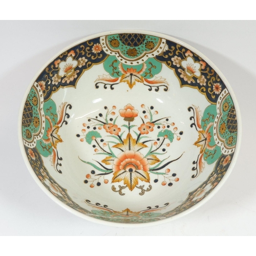 187 - A Chinese Qianlong style famille rose bowl decorated flowers, 25cm diameter