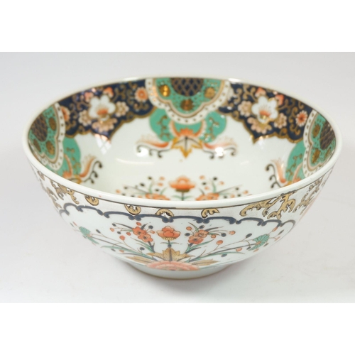 187 - A Chinese Qianlong style famille rose bowl decorated flowers, 25cm diameter