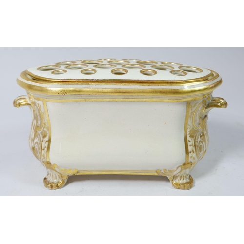 197 - An early 19th century Derby bough pot and cover painted reserve of garden flowers in gilt scrollwork... 