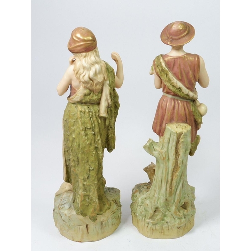 198 - A pair of Royal Dux figures of shepherd and shepherdess, 30cm