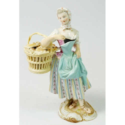 200 - A 19th century Meissen porcelain Cris de Paris figure of a pastry seller, 19cm tall, blue crossed sw... 