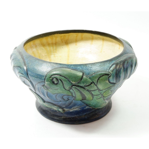 212 - A Compton Pottery dolphin bowl, 25cm diameter