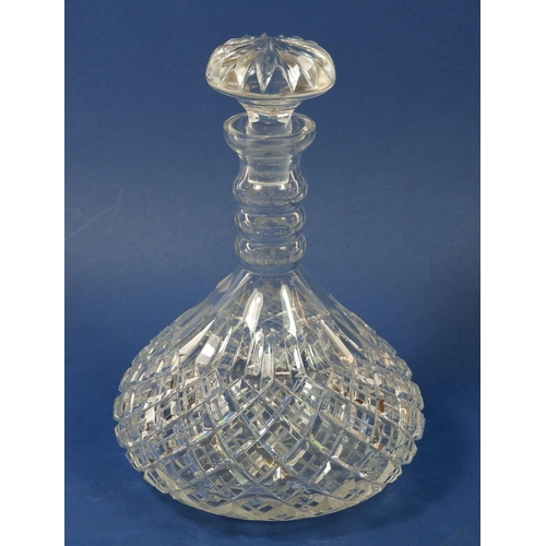 221 - A cut glass decanter, 24cm tall