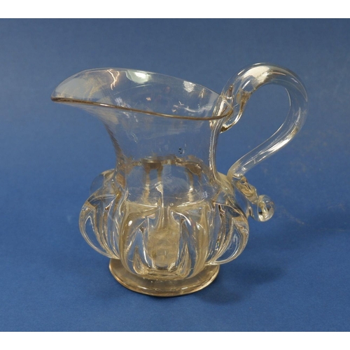 228 - A Georgian small ribbed glass jug, 10cm