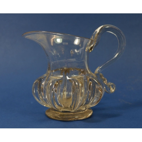 228 - A Georgian small ribbed glass jug, 10cm