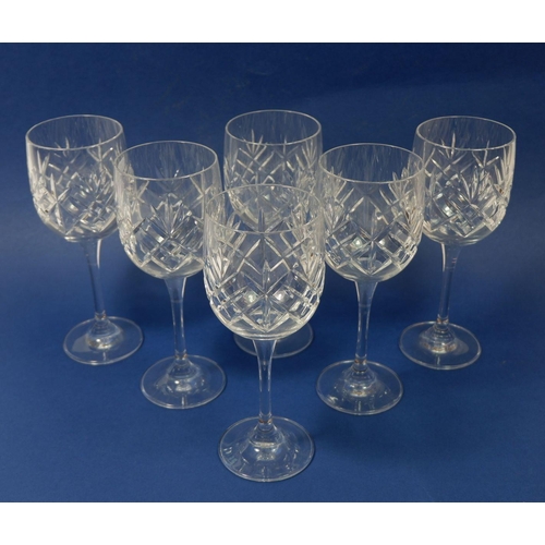 231 - A set of six cut glass wine glasses