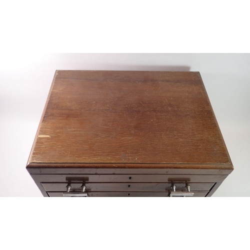 291 - An Art Deco walnut cutlery box with three drawers, 51cm wide