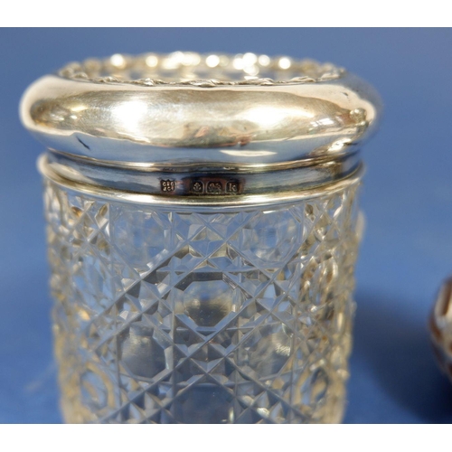 309 - A silver encased scent bottle and a dressing table jar with silver lid, Birmingham 1909